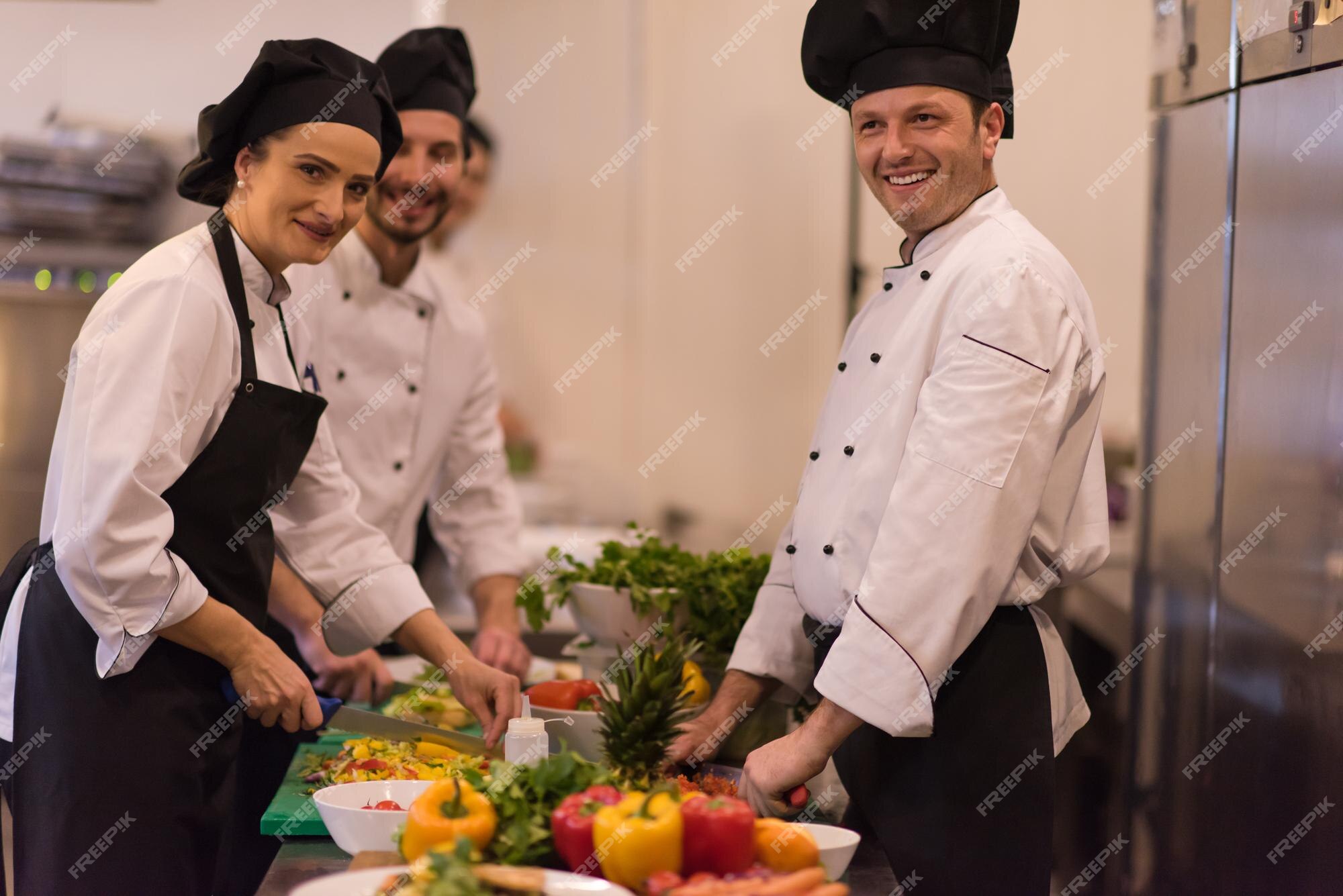 Premium Photo  The chef in the restaurant kitchen prepares