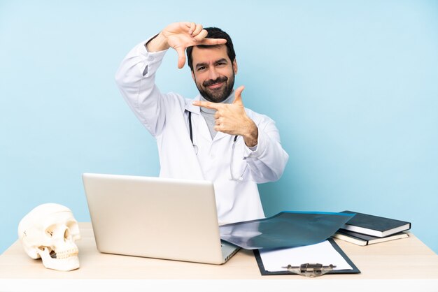 Professional traumatologist in workplace focusing face