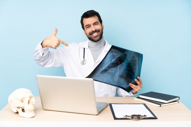 Professional traumatologist in workplace proud and self-satisfied