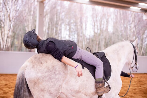 Professional treatment therapy on horseback equine therapy medical assistance therapist for phychotherapy rider improving neurologic functions