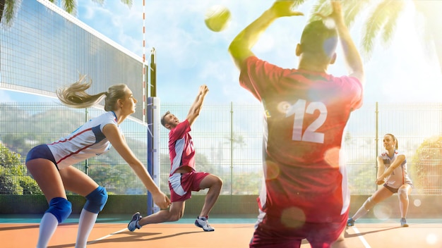 Professional volleyball players in action on the sunny day court