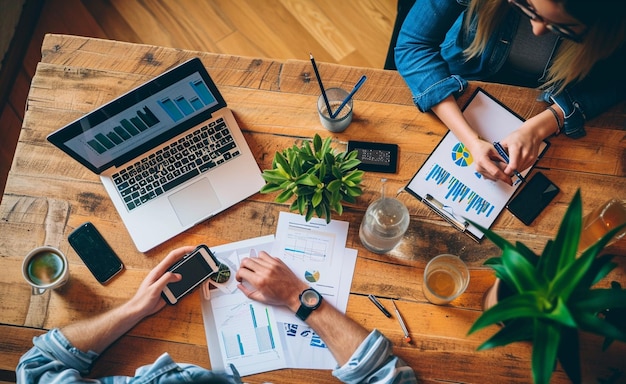 professionals at desk with laptop