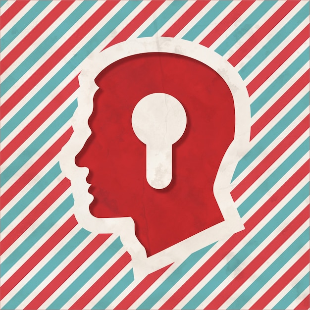 Profiel van een hoofd met een sleutelgat-pictogram op rode en blauwe gestreepte achtergrond. Vintage concept in plat ontwerp.
