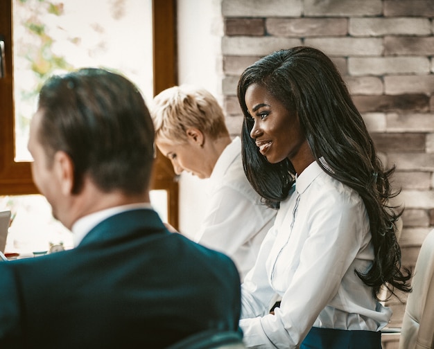 Profile Of Cheerful African business Lady At Office Meeting