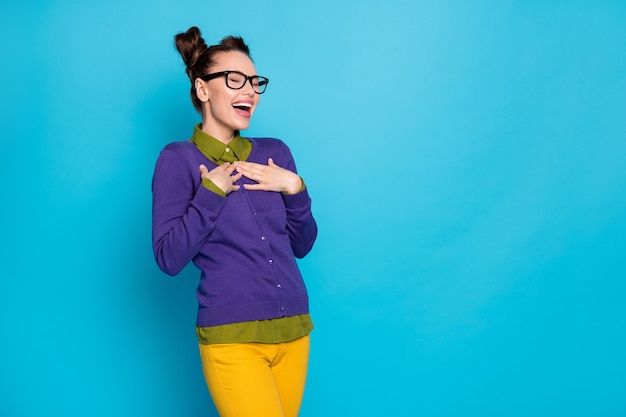 Profile photo of pretty crazy foolish lady two buns funny person laughing out loud listening humorous story wear specs shirt pullover pants isolated blue color background