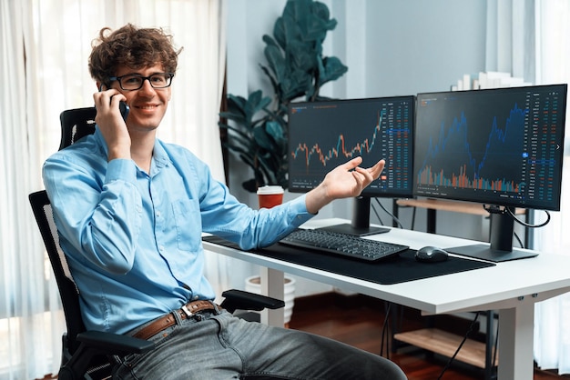 Photo profile of smiling young stock trader looking at camera while calling gusher