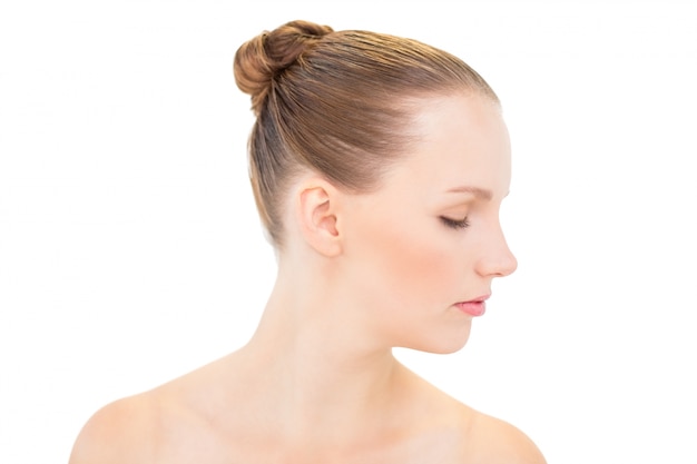 Profile view of a stern pretty blonde model