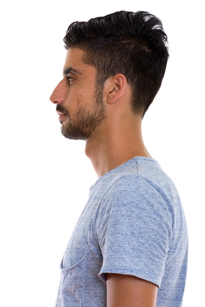 Profile view of young bearded Persian man