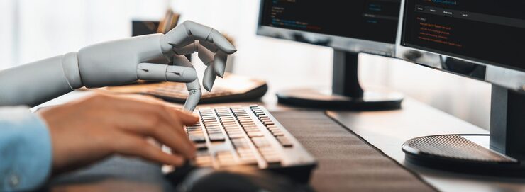 Photo program coding automation by generative artificial intelligence or ai concept collaboration between robotic hand and human software developer solving debugging or writing scripttrailblazing