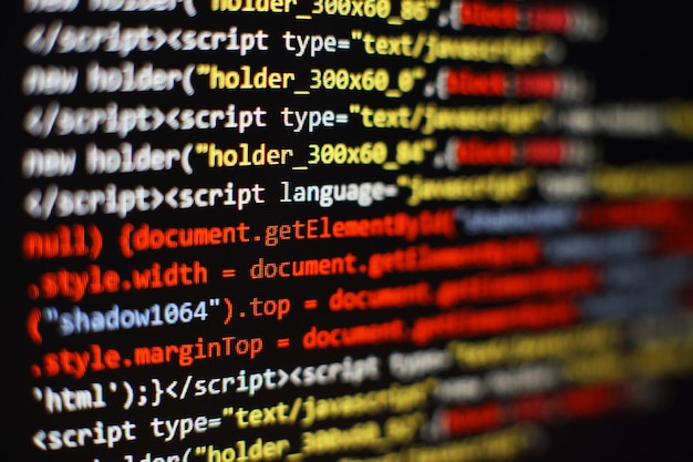 Foto programmeercode voor softwareontwikkelaars. abstracte computerscriptcode. selectieve focus