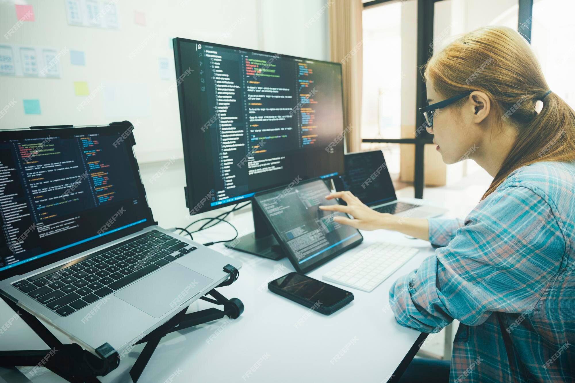 Premium Photo | Programmer is coding and programming software