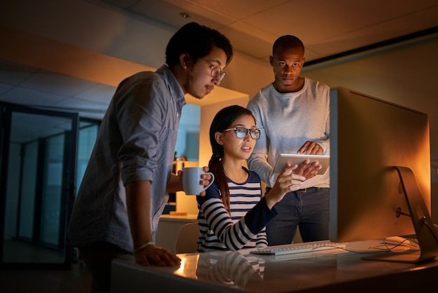programmer office and computer at night with staff and database developer team with software development planning conversation and cybersecurity update with it people and web coding strategy