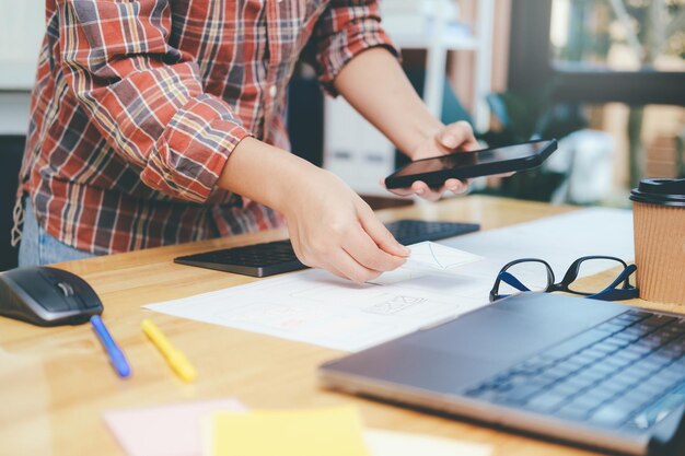 programmer and ux ui designer working in a software development and coding technologies mobile and website design and programing development technologyxa