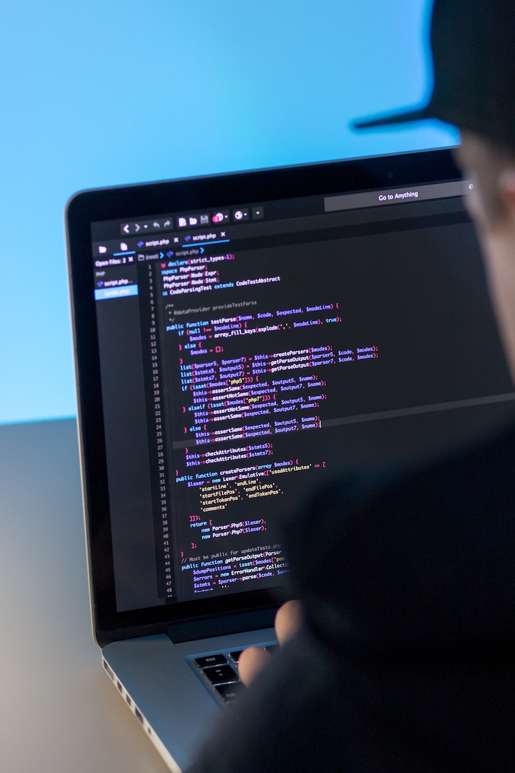 Premium Photo | Programmer working on laptop computer in office studio