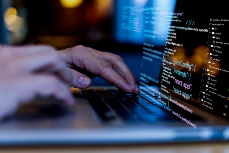 Photo programming background with person working with codes on computer