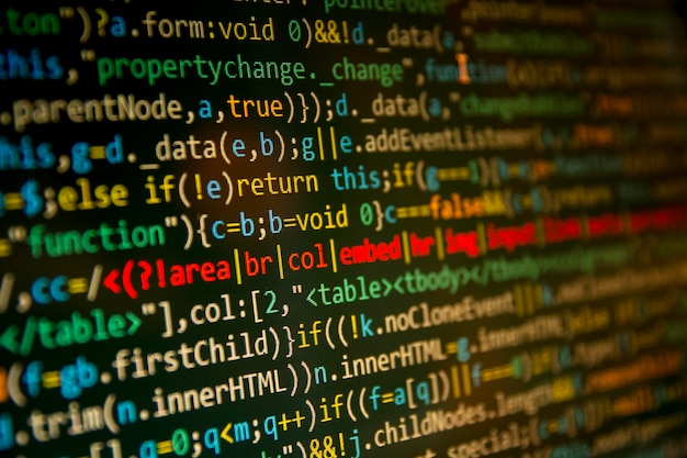 ソフトウェア開発者のプログラミングコード抽象的な画面。コンピュータコードの開発。