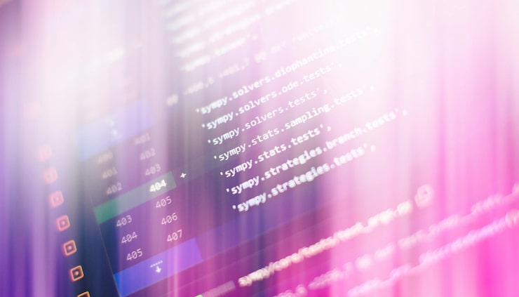 Photo programming code on computer screen software development writing program code on computer