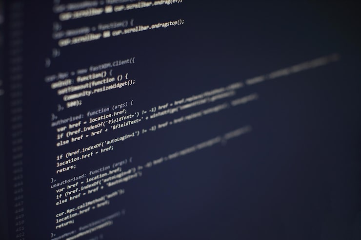 Photo programming code on computer screen. software development. writing program code on computer.