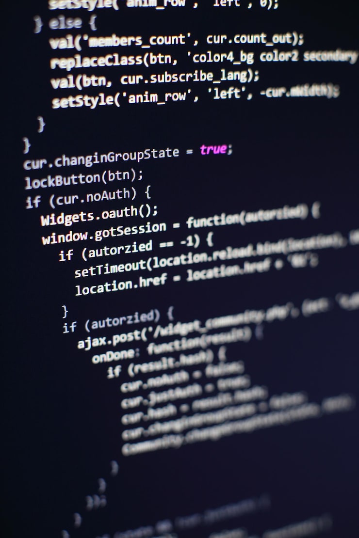 Photo programming code on computer screen. software development. writing program code on computer.
