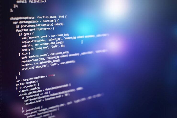 Photo programming code on computer screen. software development. writing program code on computer.