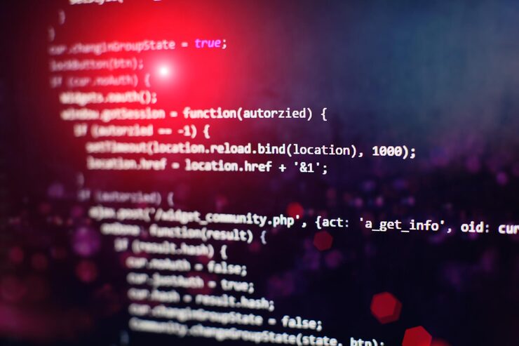 Photo programming code on computer screen. software development. writing program code on computer.