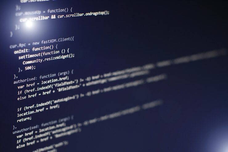 Photo programming code on computer screen. software development. writing program code on computer.