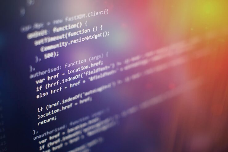 Photo programming code on computer screen. software development. writing program code on computer.