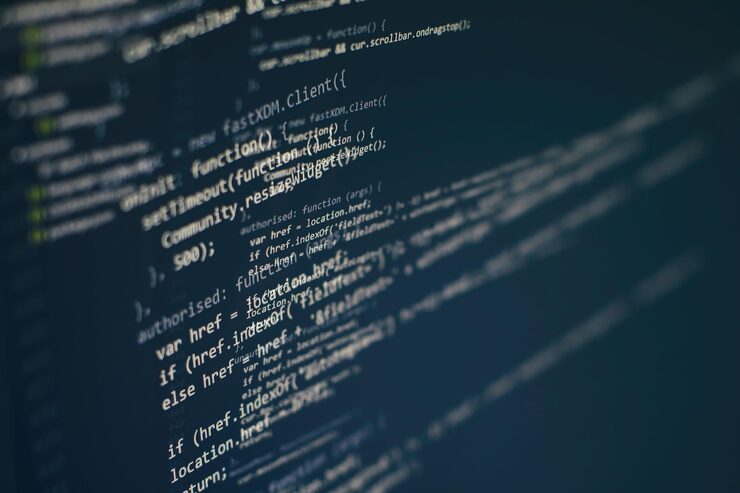 Photo programming code on computer screen. software development. writing program code on computer.