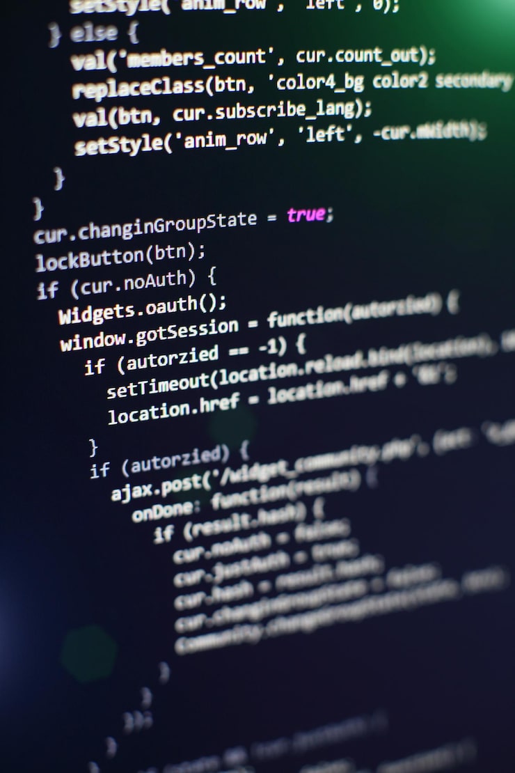 Photo programming code on computer screen. software development. writing program code on computer.