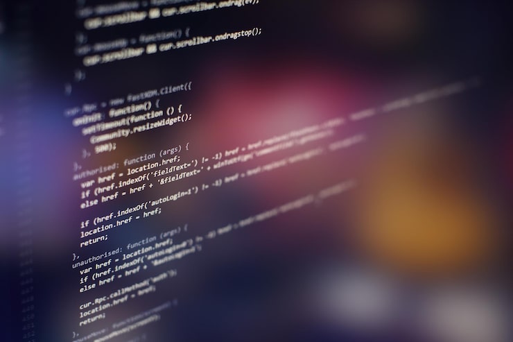 Photo programming code on computer screen. software development. writing program code on computer.