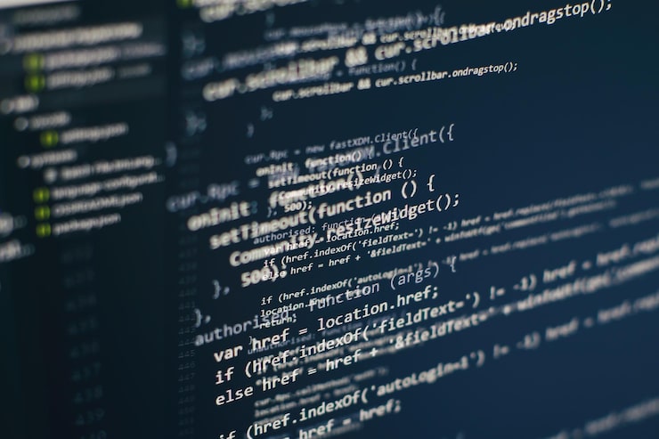 Photo programming code on computer screen. software development. writing program code on computer.