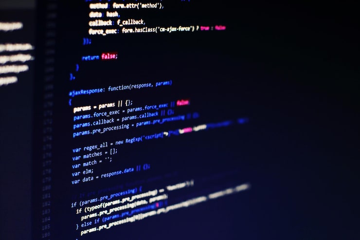 Photo programming code on computer screen. software development. writing program code on computer.