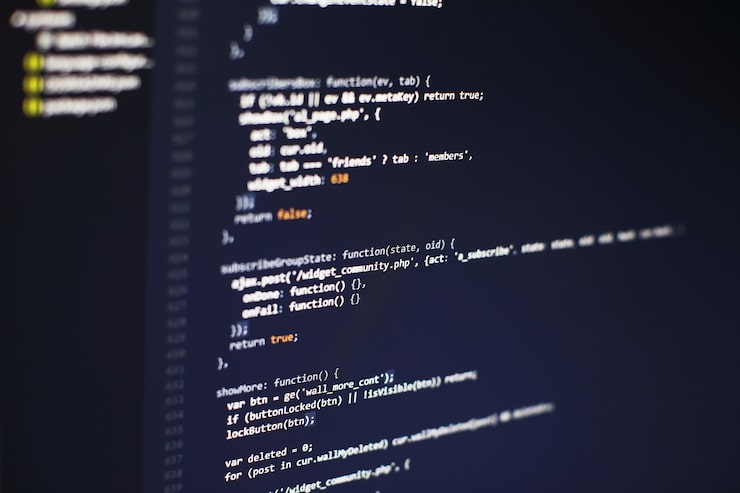 Photo programming code on computer screen. software development. writing program code on computer.