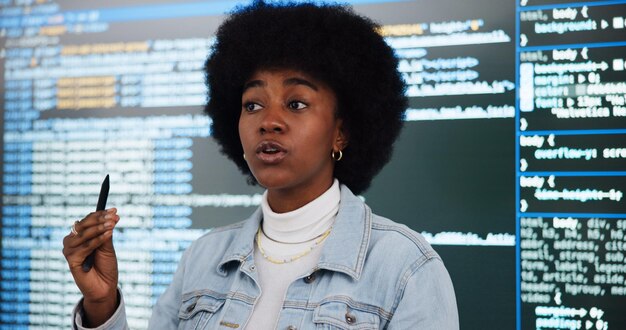 Programming lecture student and woman in college for learning education and teaching ai course African person class and study coding with data for software development in presentation on screen