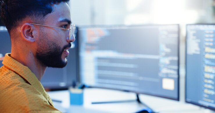 Photo programming man or smile with computer screen for software development reading information or system update employee coding and cyber security with it database for data analysis or script testing