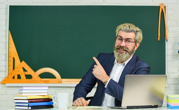 programming web development handsome man use modern technology digital technology apply online course selecting specific courses school teacher programming laptop learn programming language