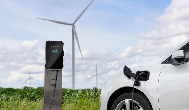 Progressive combination of EV car charging station and wind turbine