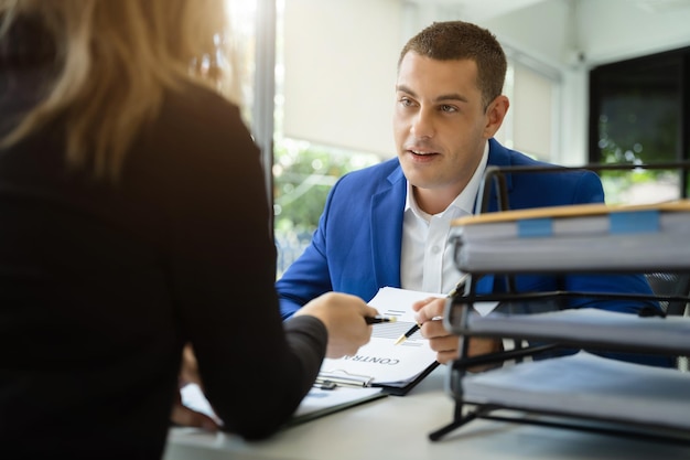 Project manager working and update tasks with milestones
progress planning and photo professional investor working new start
up project in the office