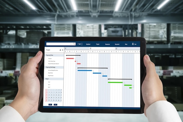 Project planning software for modish business project management on the computer screen showing timeline chart of the team project