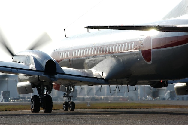 Propeller airplane ys-11 taxiing to runway for take off