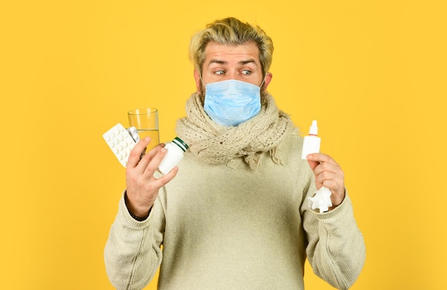 Protect yourself cough cold and runny nose remedy you need to be strong Tolerating the drug well coronavirus from china Unhealthy man wear respirator mask Medication and increased fluid intake