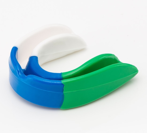 Protection for the teeth in the martial arts on a white background. sportswear