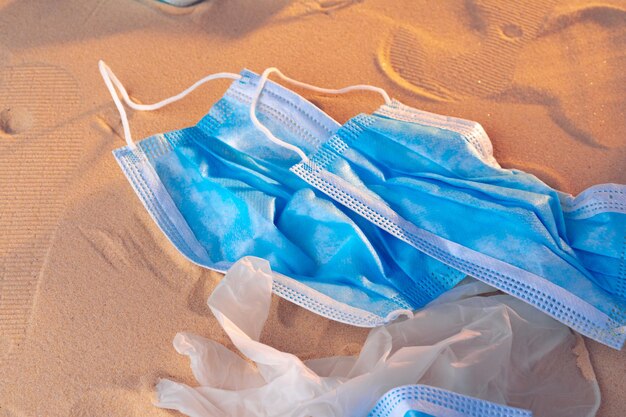 Protective facial mask on the natural outdoors beach background