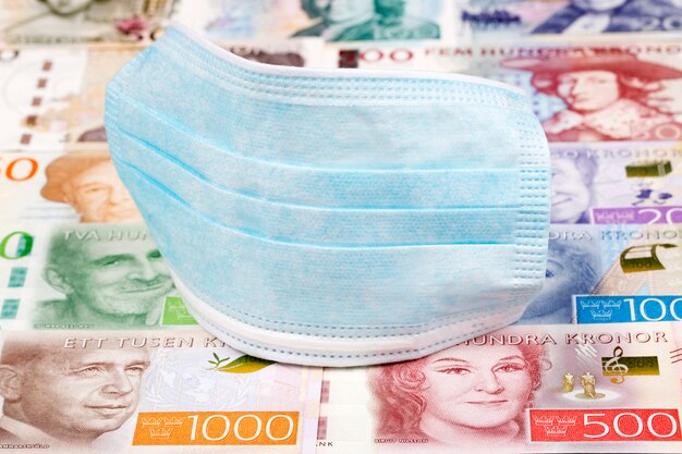 Protective mask on Swedish money