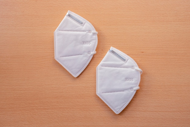 Protective masks on the wooden table