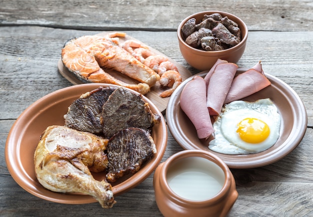 Protein diet:cooked products on the wooden background