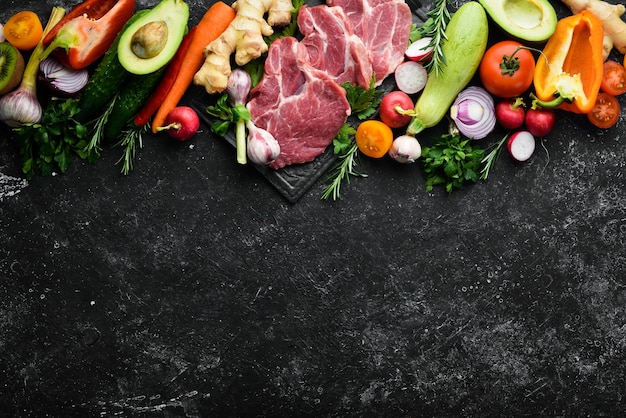 Protein menu veal meat vegetables and fruits Food background