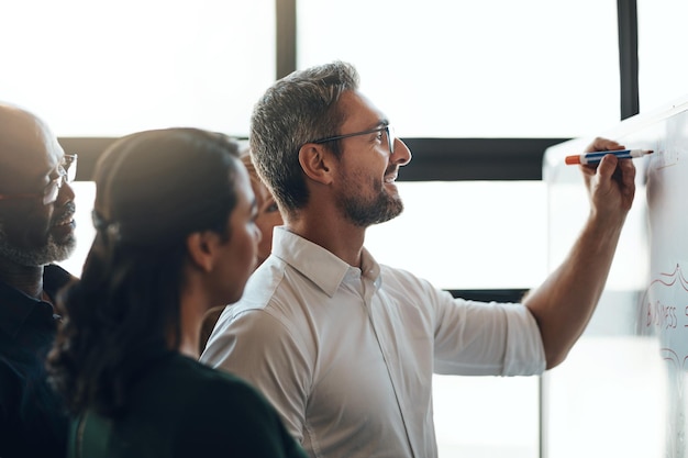 Photo providing honest data in a honest way. shot of a businessman giving a presentation to his colleagues in a boardroom.