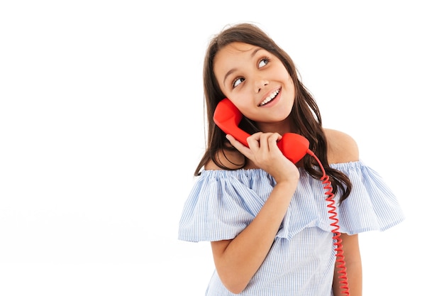 Prretty cute girl talking by telephone.