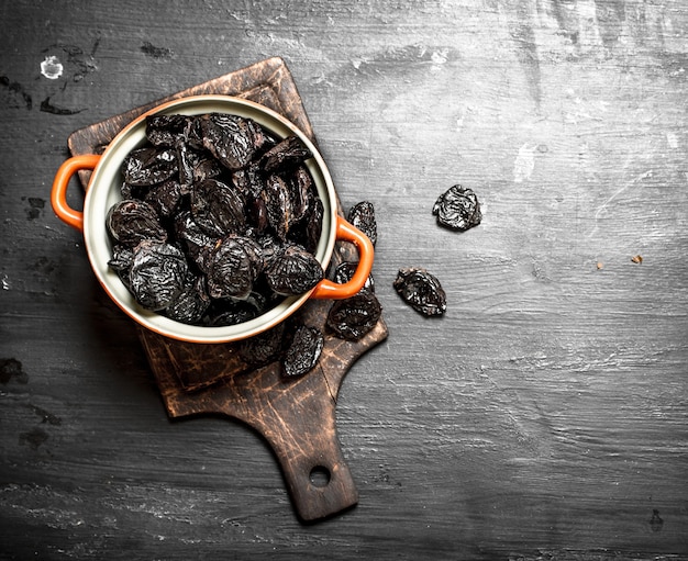 Prunes in a bowl .